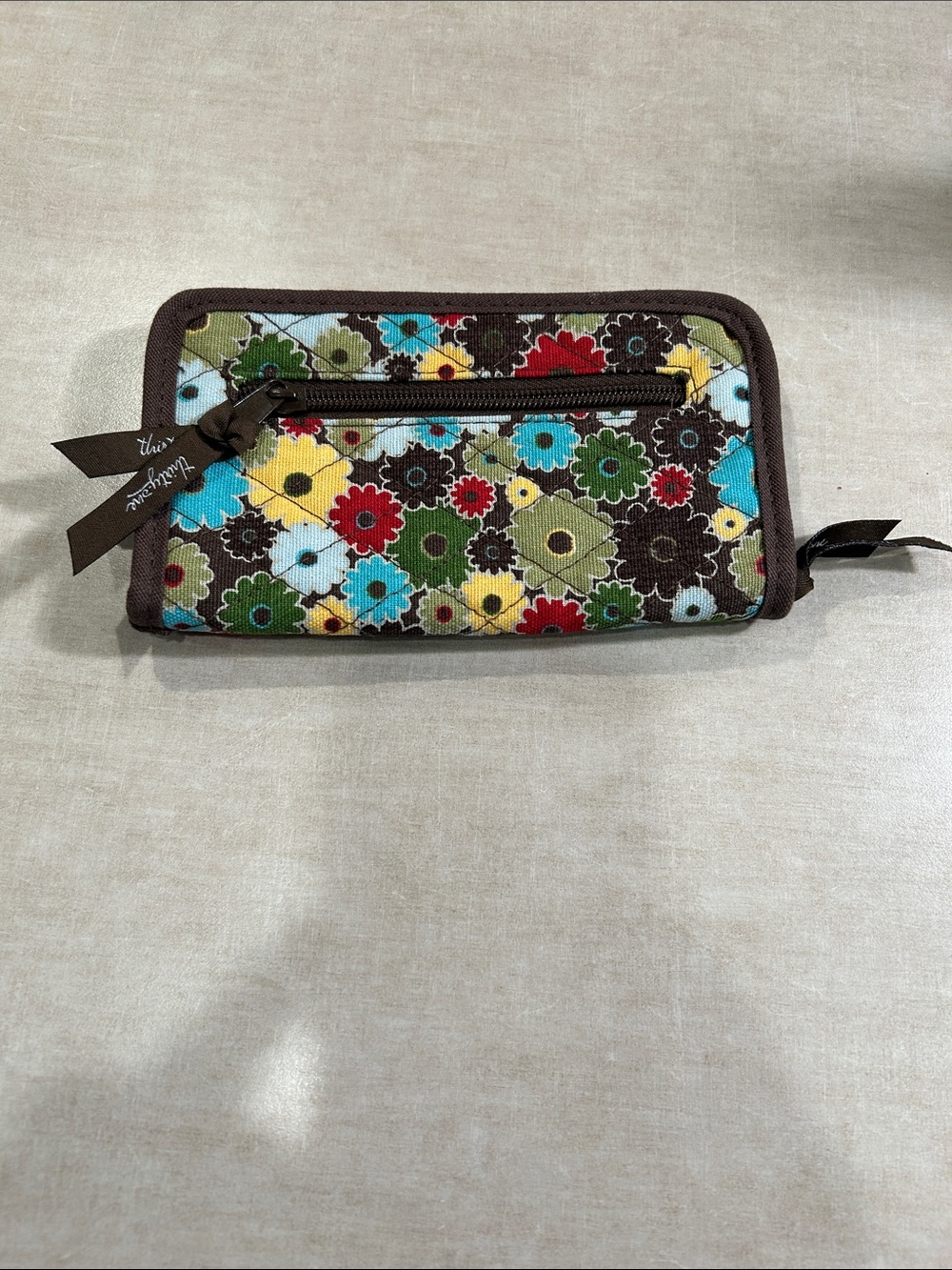 Floral Zip-Around Wallet in Multicolor. Like new. Size 7 x 4.3”. Phone size.